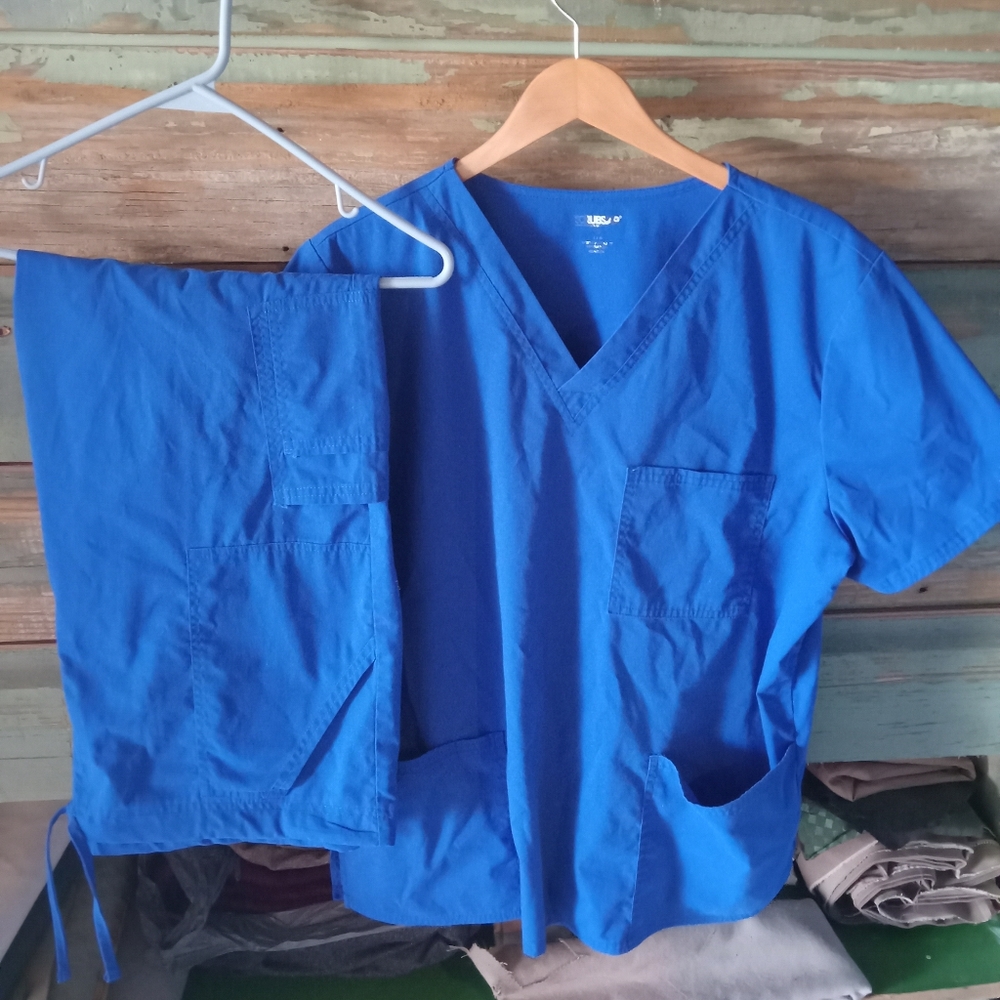 2 sets of scrubs L and XL